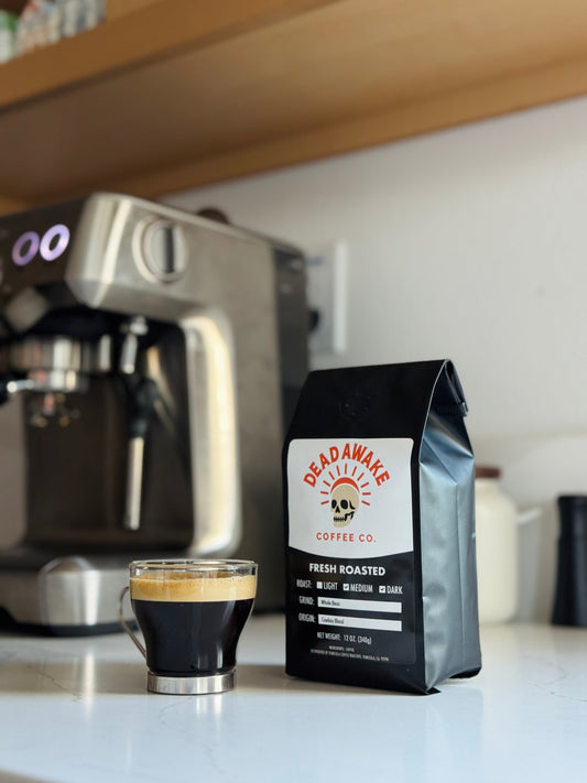 Dead Awake Coffee bag with espresso machine and fresh cup